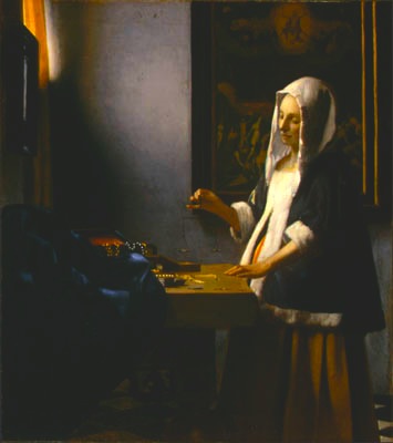 vermeerwomanholdingscales vermeerwomanholdingscales