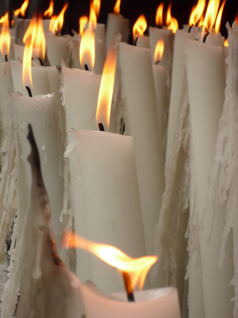 candle-flames-at-lourdes