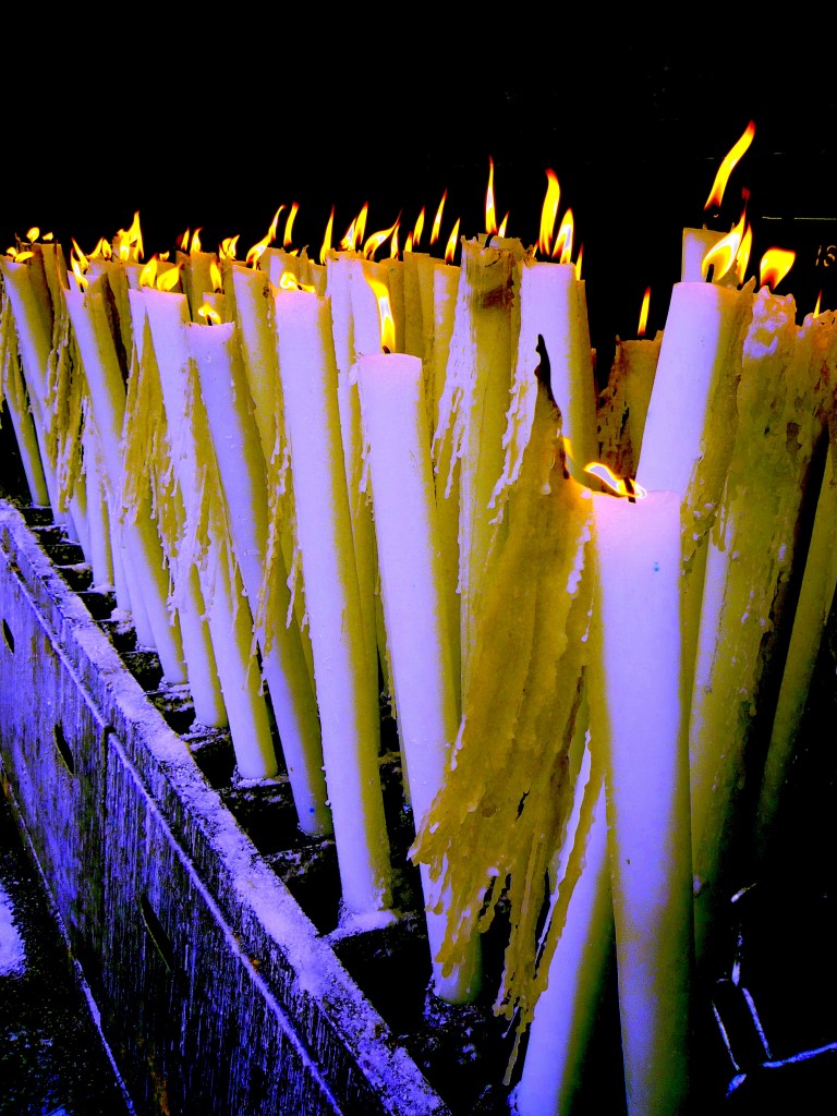 candles at Lourdes